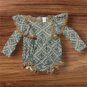 Kate Quinn Geometric Ruffle Bodysuit in Black and Cream